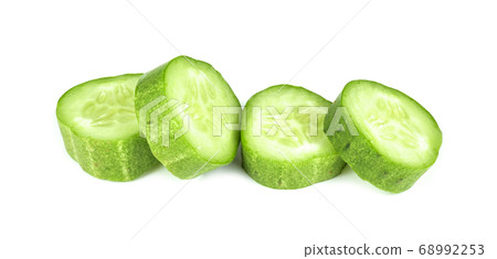 Fresh cucumber slice isolated on white background Fresh cucumber slice isolated on white background 68992253