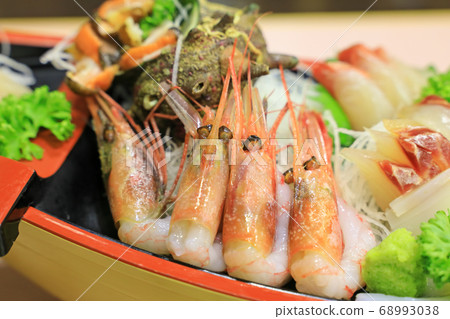 Delicious sashimi boat platter 68993038