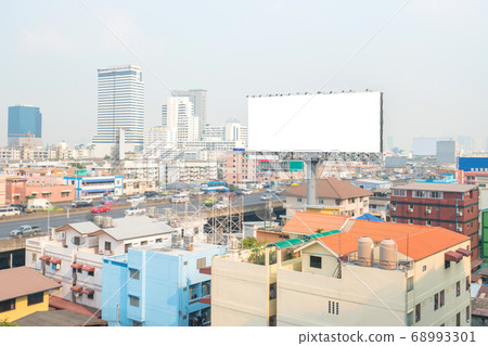 Mockup image of Blank billboard white screen posters in the city on road for advertising background Mockup image of Blank billboard white screen posters in the city on road for advertising background 68993301