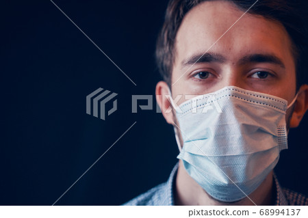 Man in mask. 68994137