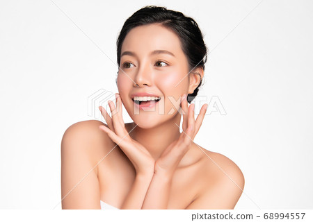Beautiful Young asian Woman with Clean Fresh Skin, on white background, Face care, Facial treatment 68994557