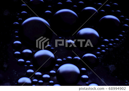blurred abstract background of oil bubbles in low 68994902