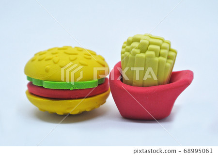 Selected focused of burger and french fries made from colorful toy soft rubber isolated on white background.  68995061