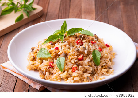 Stir fried rice with clams and roasted chili paste Stir fried rice with clams and roasted chili paste 68995922