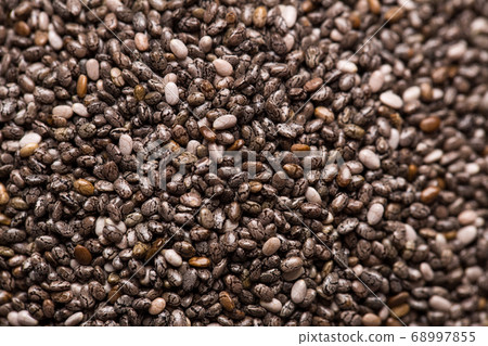 Texture of chia seeds closeup. Texture of chia seeds closeup. 68997855