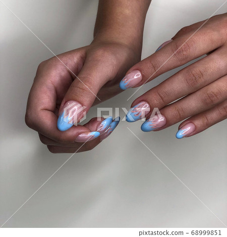Woman with flesh-colored manicure with design, Woman with flesh-colored manicure with design, 68999851