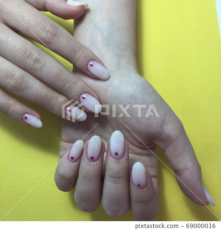 Manicure of different colors on nails. Female Manicure of different colors on nails. Female 69000016
