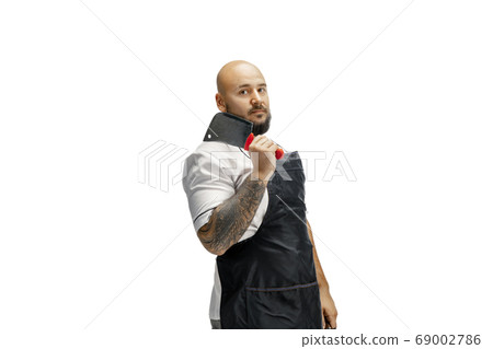 Portrait of a male chef cook, butcher isolated on a white studio background 69002786