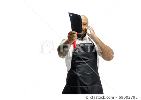 Portrait of a male chef cook, butcher isolated on a white studio background 69002795