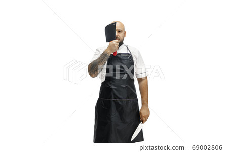 Portrait of a male chef cook, butcher isolated on a white studio background 69002806