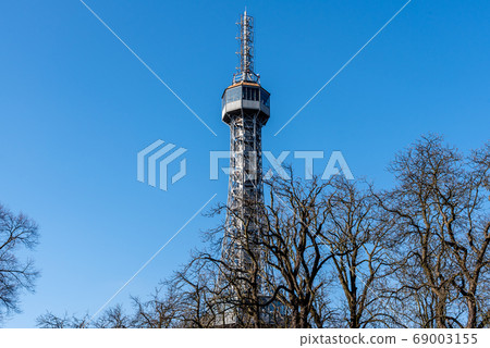 Petrin Tower. Detailed view on sunny day with blue sky background. Prague, Czech Republic 69003155