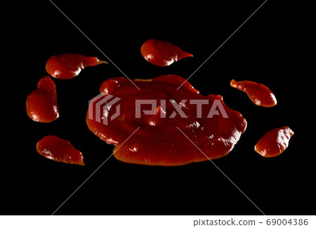 drops of spilled tomato ketchup with spices 69004386