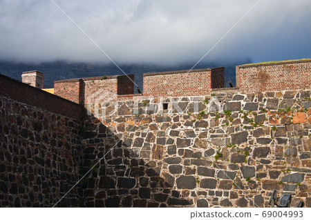 Wall of the fortress with cannons 69004993