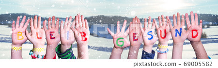 Kids Hands Holding Word Bleib Gesund Means Stay Kids Hands Holding Word Bleib Gesund Means Stay 69005582