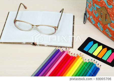 School supplies on wooden desk. Set of stationery School supplies on wooden desk. Set of stationery 69005706