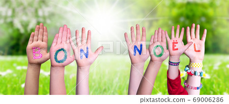 Children Hands Building Word Bon Noel Means Merry Children Hands Building Word Bon Noel Means Merry 69006286