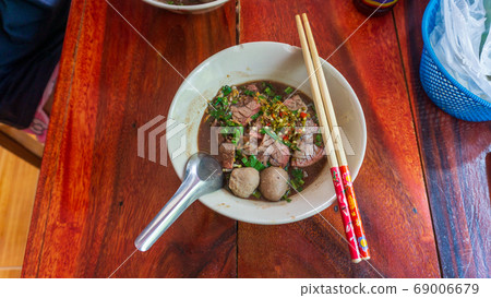 Small Noodles with Fresh Beef Balls on the table 69006679