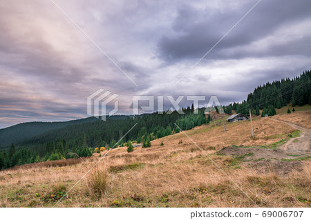 Summer landscape in mountains and the dark cloudy 69006707