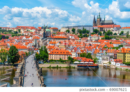 Prague panorama with Prague Castle, and Charles Bridge over Vltava River. View from Old Town Bridge Tower, Czech Republic 69007621