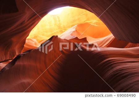Lower Antelope Canyon with a fantastic and beautiful pattern that shines in in the summer sun Lower Antelope Canyon with a fantastic and beautiful pattern that shines in in the summer sun 69008490