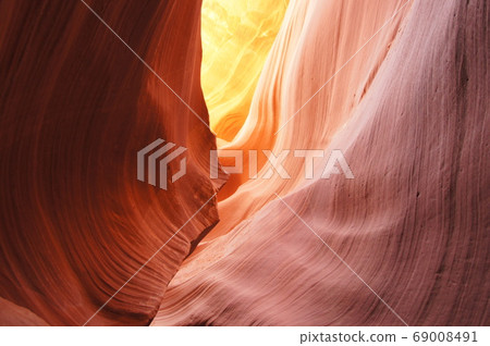 Lower Antelope Canyon with a fantastic and beautiful pattern that shines in in the summer sun Lower Antelope Canyon with a fantastic and beautiful pattern that shines in in the summer sun 69008491