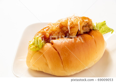 Rolled bread sandwich chicken Nanban. (White background) Rolled bread sandwich chicken Nanban. (White background) 69009053