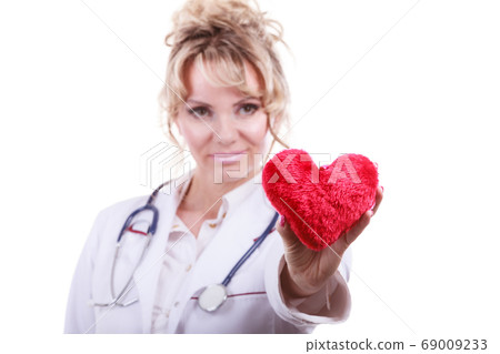 Female doctor with heart. Female doctor with heart. 69009233