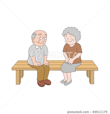 An elderly couple relaxing on a bench An elderly couple relaxing on a bench 69011179