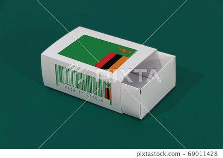 Zambia flag on white box with barcode and the color of nation flag on green background Zambia flag on white box with barcode and the color of nation flag on green background 69011428