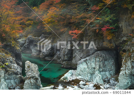 Autumn valley. Scenery of Ishizuchi National Monument. 69011844