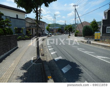 A curved road in Chichibu city A curved road in Chichibu city 69011859