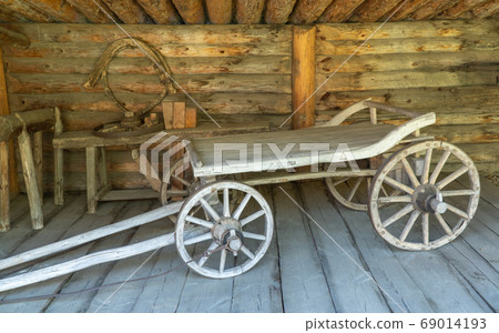 the old wooden cart under a shed the old wooden cart under a shed 69014193