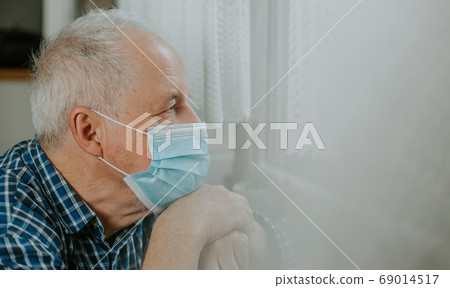 Senior man quarantined at home during coronavirus, covid-2019 pandemic, stay safe Senior man quarantined at home during coronavirus, covid-2019 pandemic, stay safe 69014517