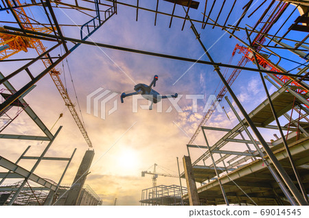 Drone over construction site. video surveillance 69014545