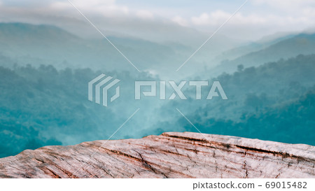 wood countertop with forest and mountain in spring wood countertop with forest and mountain in spring 69015482