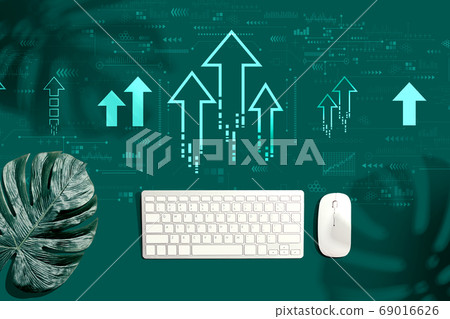 Rising arrow theme with a computer keyboard Rising arrow theme with a computer keyboard 69016626