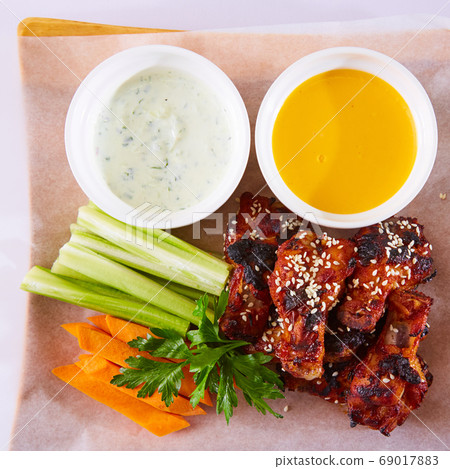 boneless buffalo bbq chicken wngs with ranch sauce boneless buffalo bbq chicken wngs with ranch sauce 69017883