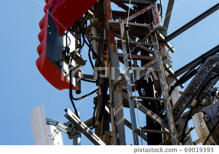 Telecommunication tower with antennas of cellular Telecommunication tower with antennas of cellular 69019393