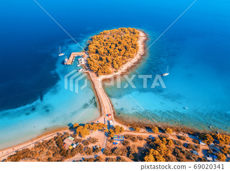 Aerial view of beutiful small island in sea bay at sunset in autumn in Murter, Croatia. Top view 69020341