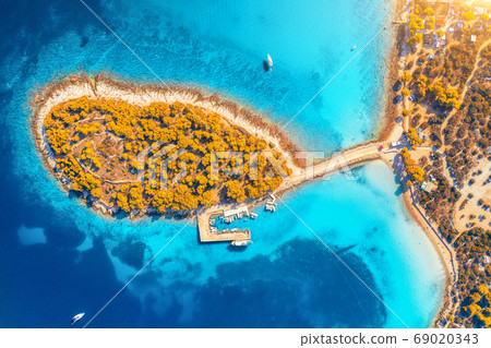 Aerial view of beutiful small island in sea bay at sunset in autumn in Murter, Croatia. Top view 69020343