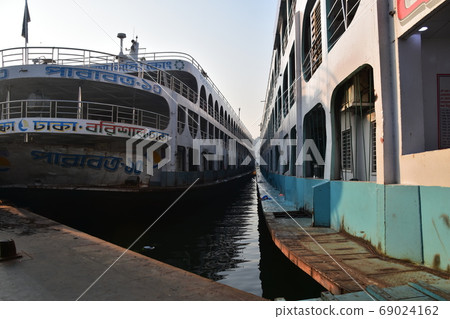 A long-distance ship at Dhaka Shodorut in Bangladesh Retro hull and cabin 69024162