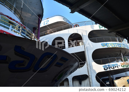 A long-distance ship at Dhaka Shodorut in Bangladesh Retro hull and cabin 69024212