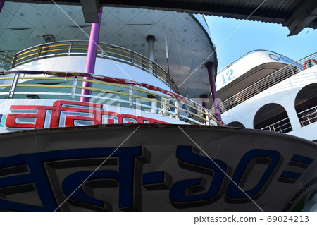 A long-distance ship at Dhaka Shodorut in Bangladesh Retro hull and cabin 69024213