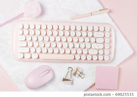 flat lay stationery on work desk in pink pastel background flat lay stationery on work desk in pink pastel background 69025535