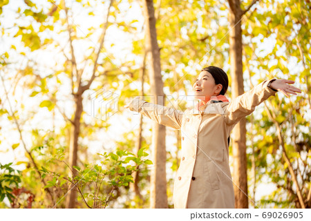 Image of a woman in autumn nature Image of a woman in autumn nature 69026905