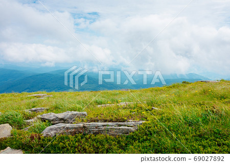 rocks on the hillside. summer mountain landscape on carpathians rocks on the hillside. summer mountain landscape on carpathians 69027892
