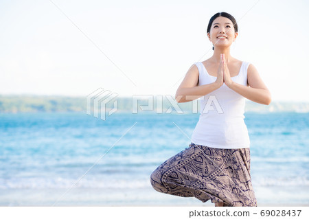 Female health image sea background 69028437