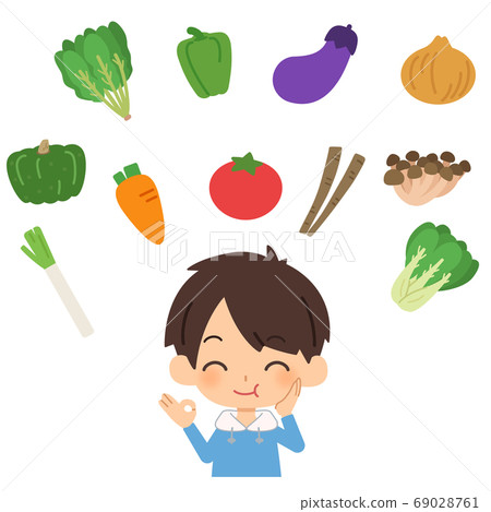 A boy eating vegetables deliciously A boy eating vegetables deliciously 69028761