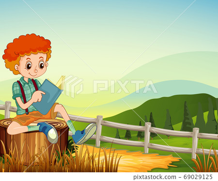 Boy sitting reading book in the farm scene Boy sitting reading book in the farm scene 69029125
