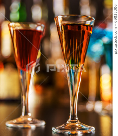 refreshing liqueur in a tall glass, alcoholic refreshing liqueur in a tall glass, alcoholic 69033306